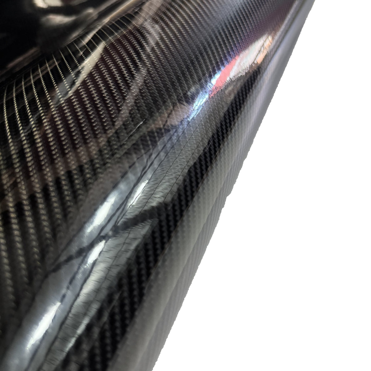 Detalle de la trama del vinilo carbono negro brillo Premium